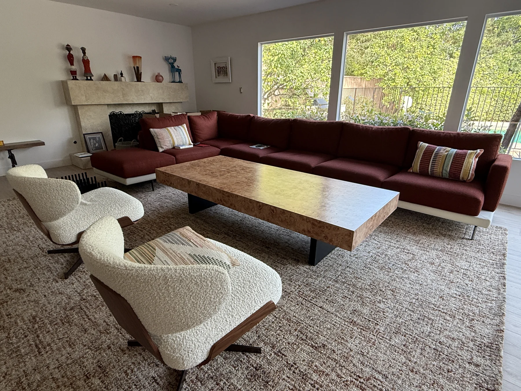 Custom burl coffee table in the finished living room — image 1