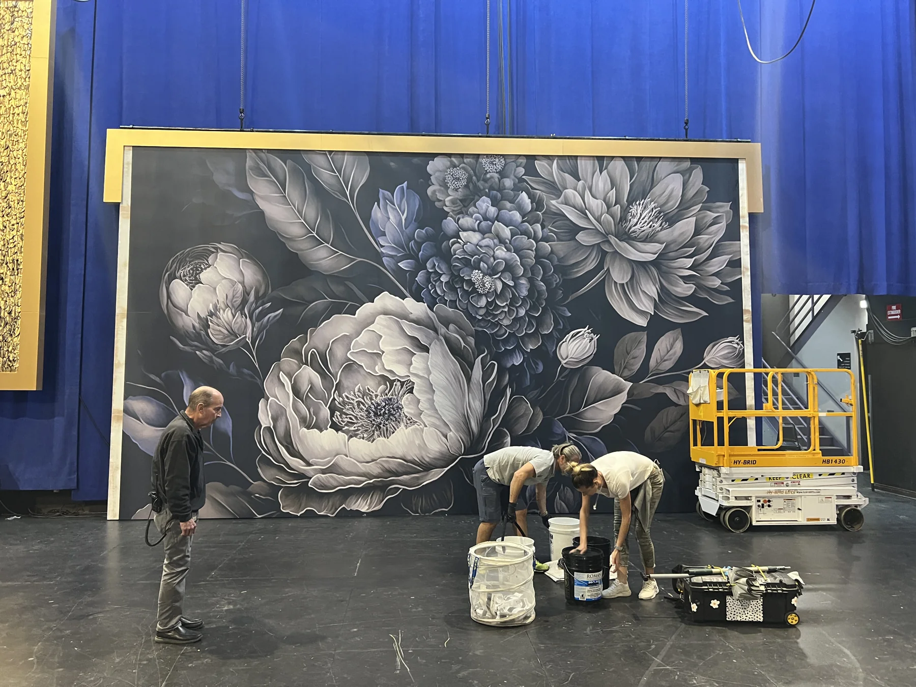 Completed scenic panel installation on stage — image 1