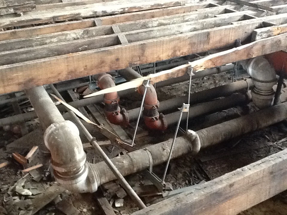 Existing mechanical systems exposed during renovation — image 2