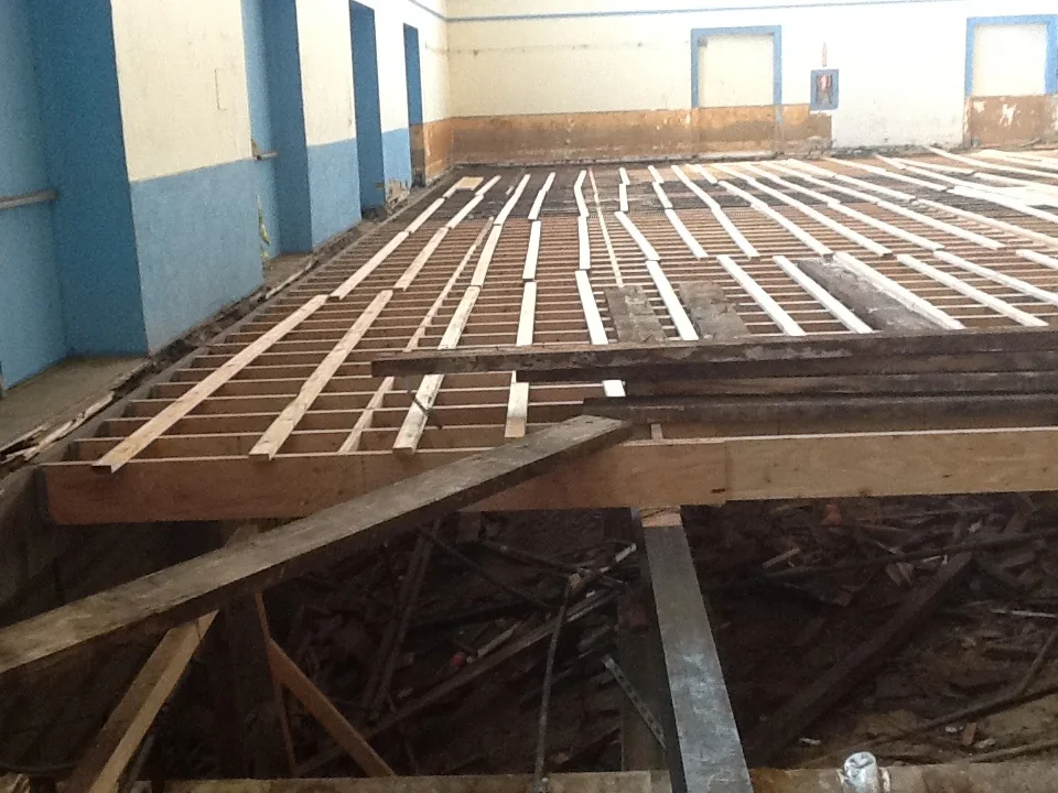 Wide view of reconstructed floor framing — image 6